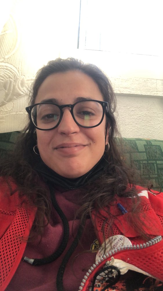 Alicia wearing a red jacket